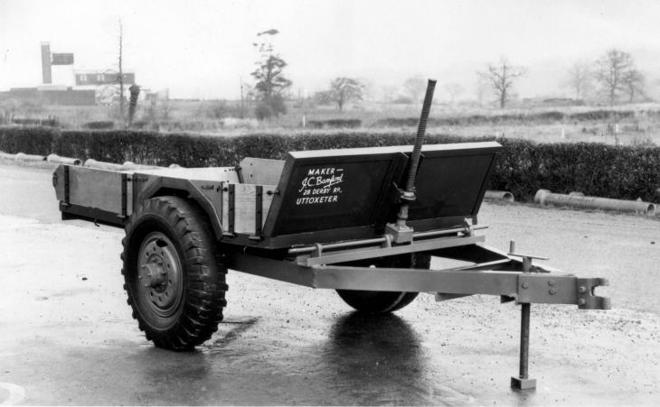 1945___Mr_JCB_s_first_product__a_tipping_trailer_made_from_war_time_scrip_02.jpg