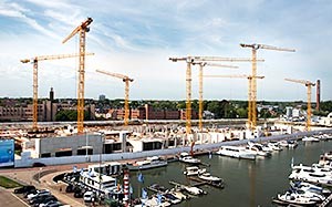 Mehr Informationen zu "Wolff Krane bauen blaues Stadtviertel"