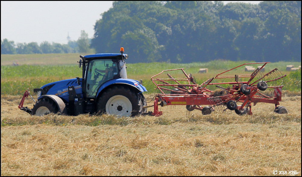 New_Holland_T6_Kuhn_Schwader_GA7501.thumb.jpg.0d13c52291e0d3a775bcd6bb80f070f6.jpg