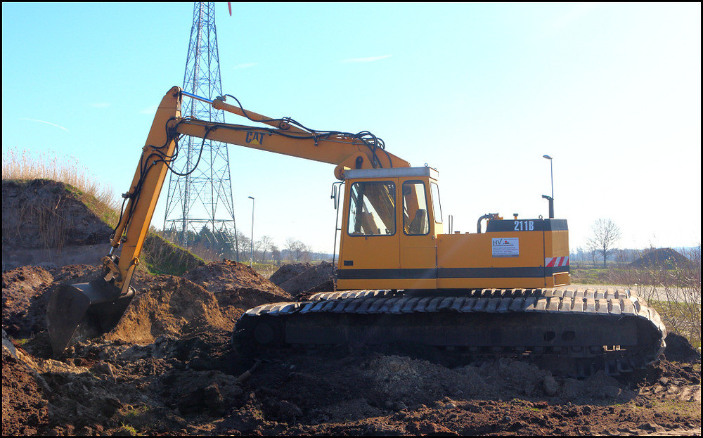 Caterpillar_211B_Torfabbau3.thumb.jpg.368a02fa86f9f535a3e5718e615e5b3f.jpg