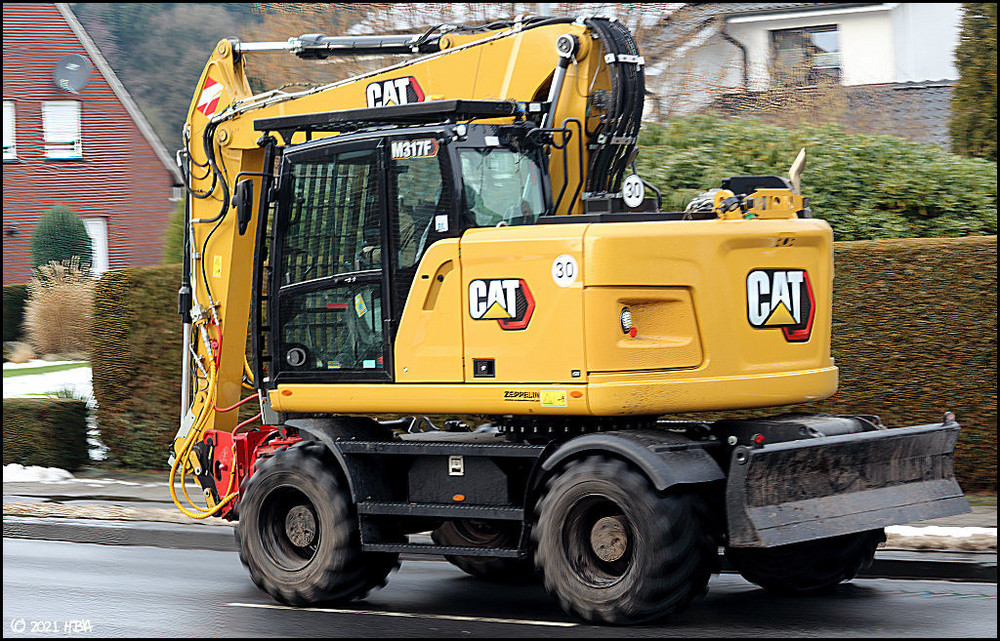 Caterpillar_M317F_Forst.thumb.jpg.6fd6db67a9b1943f44f0115af9b78f8c.jpg