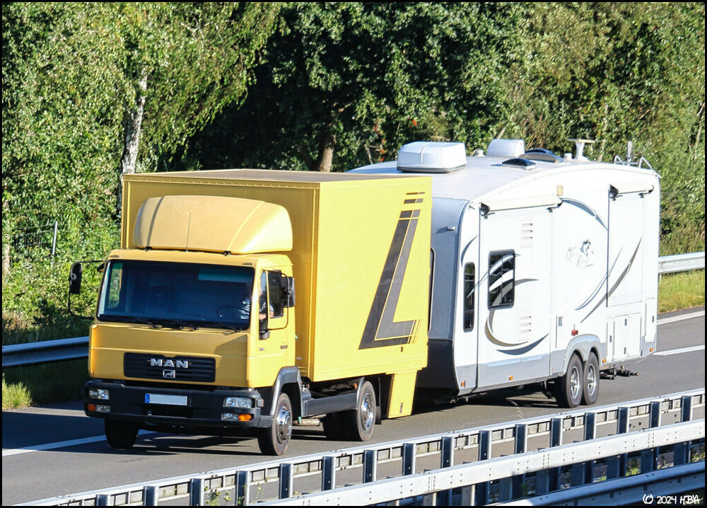 MAN_LE2000Wohnwagen.thumb.jpg.36335ce6e1a033a1f338618a44ec52cb.jpg