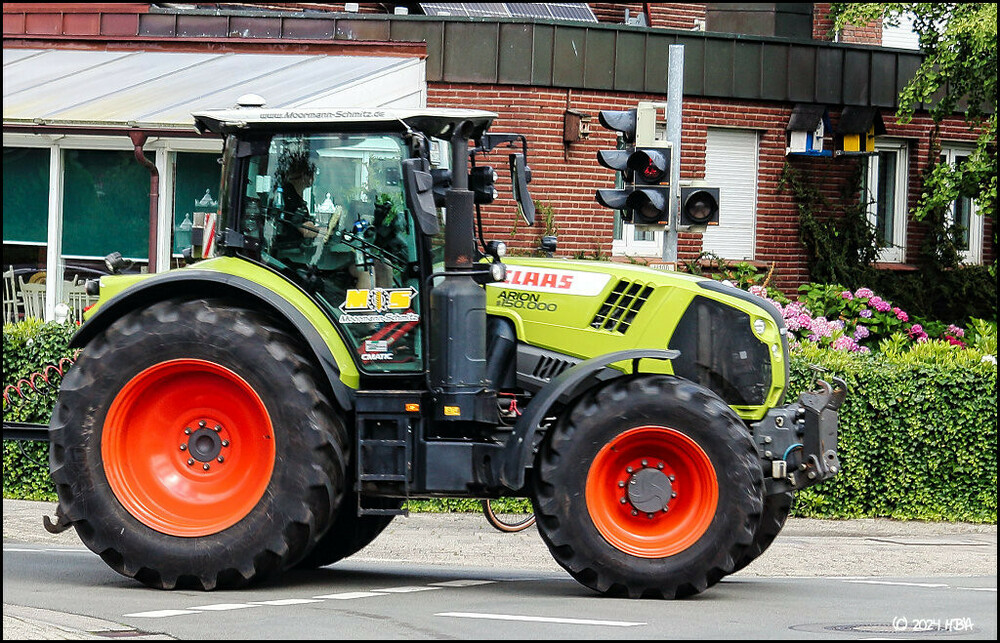 Claas_Arion660_150000.thumb.jpg.4a19871c7eb3344bc4d8e389ca56e04f.jpg