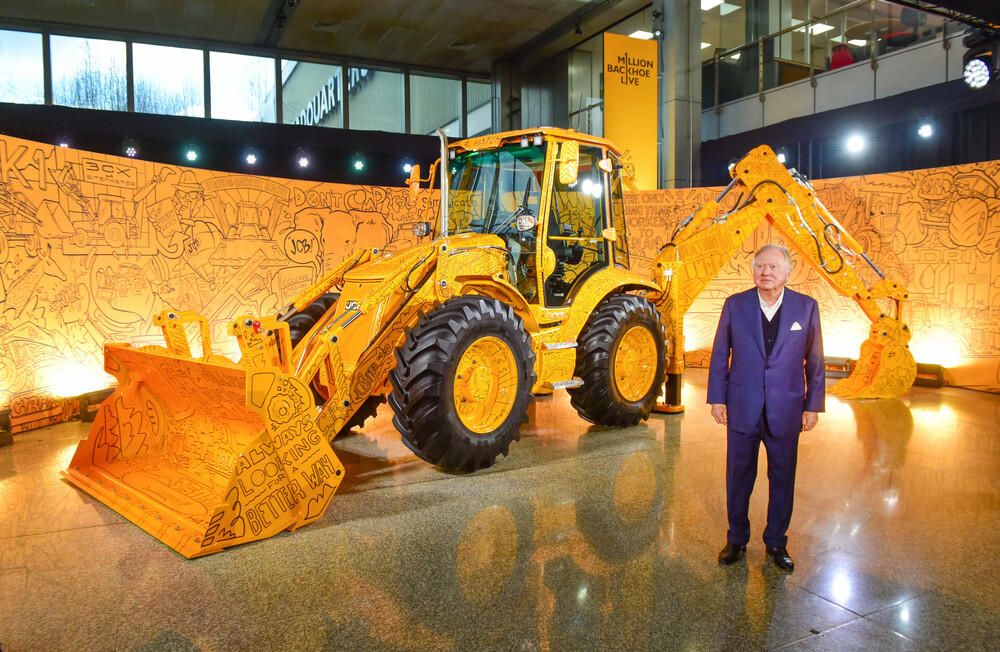 2025 - Lord Bamford with the JCB Millionth Backhoe.jpg